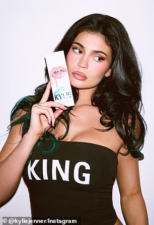 On Saturday the mother-of-two promoted her latest makeup collection while posing in a black tube top with 'king' emblazoned across the front in capital white letters