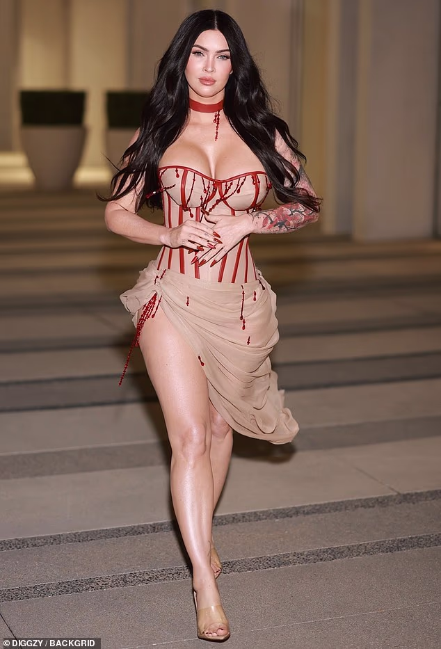 The Transformers actress made a statement wearing a nude-colored dress with a corset bodice and skirt with ruched fabric around her lower waist