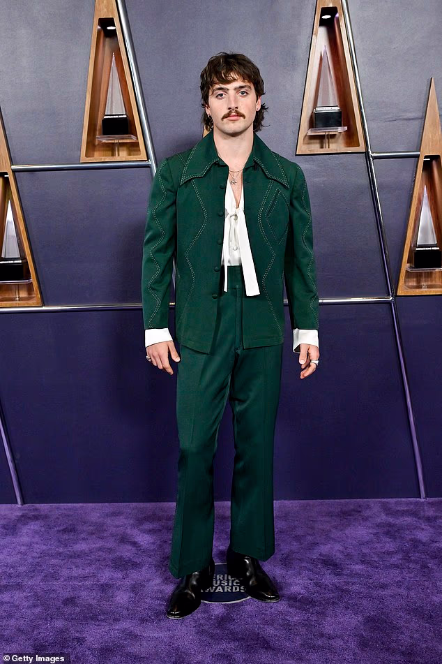 The steamy snap comes on the heels of Boone¿s American Heart tour, which kicked off in August ¿ and made headlines for a reason the singer probably didn¿t anticipate; (pictured May)